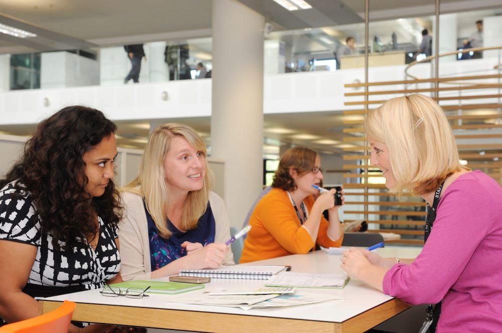 Staff at a meeting in Horizon House