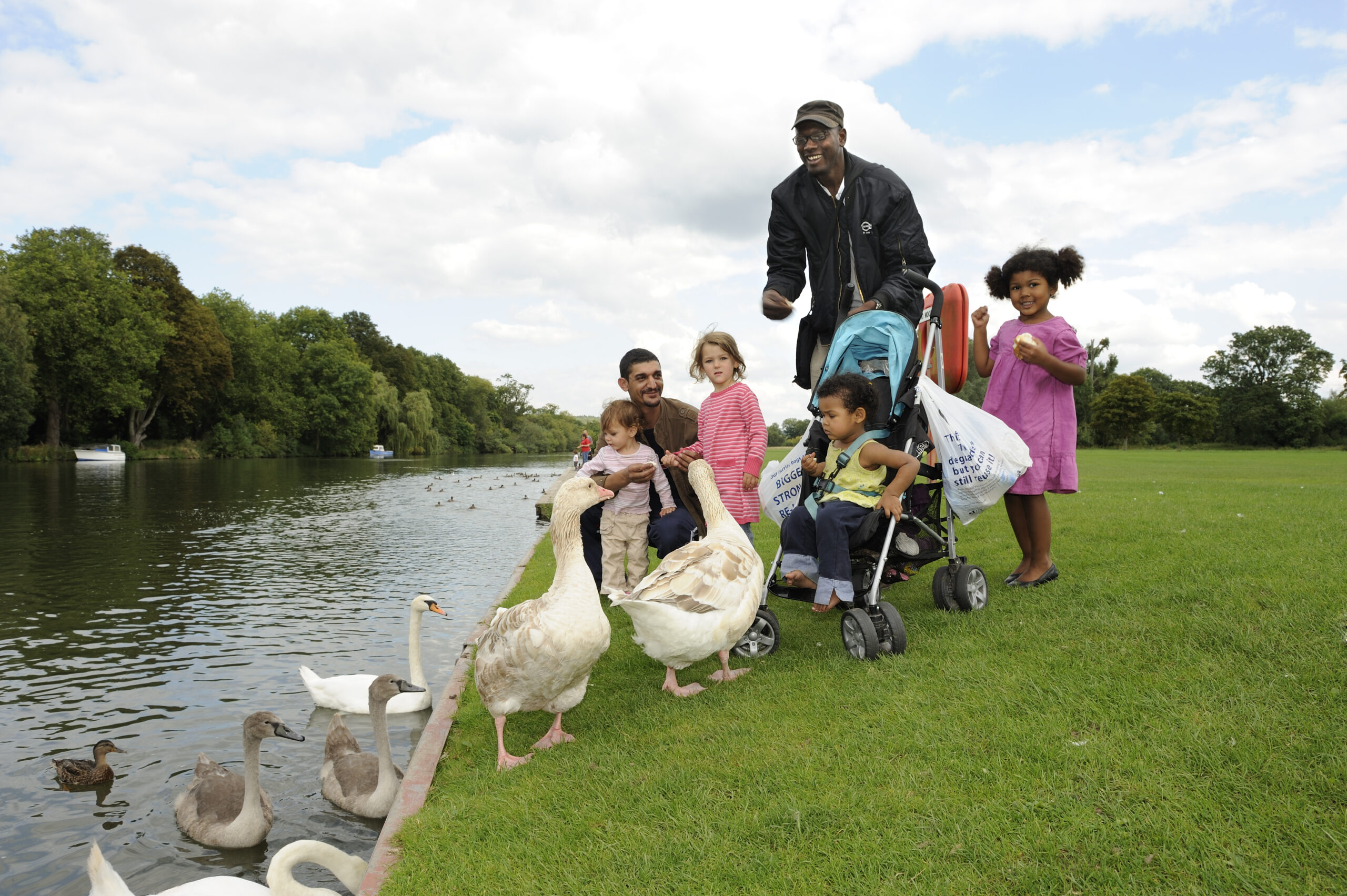 Family feeding the ducks