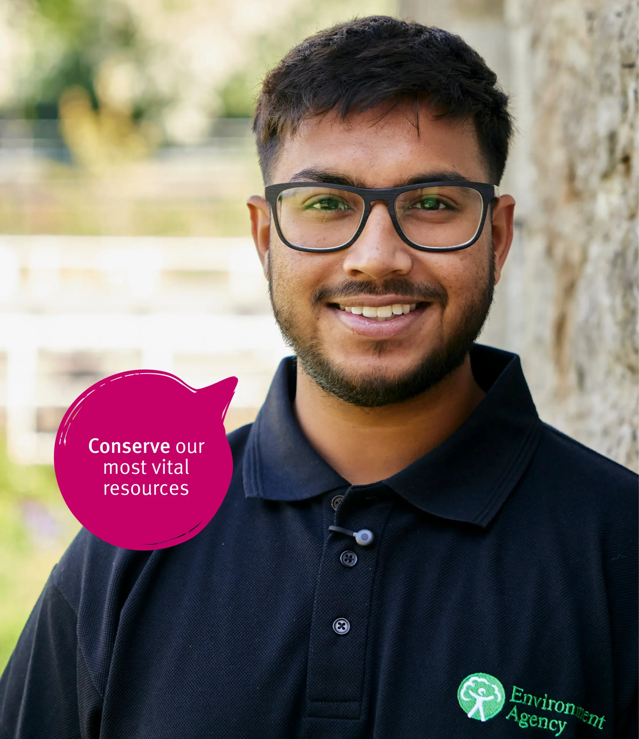 Boy with glasses smiling