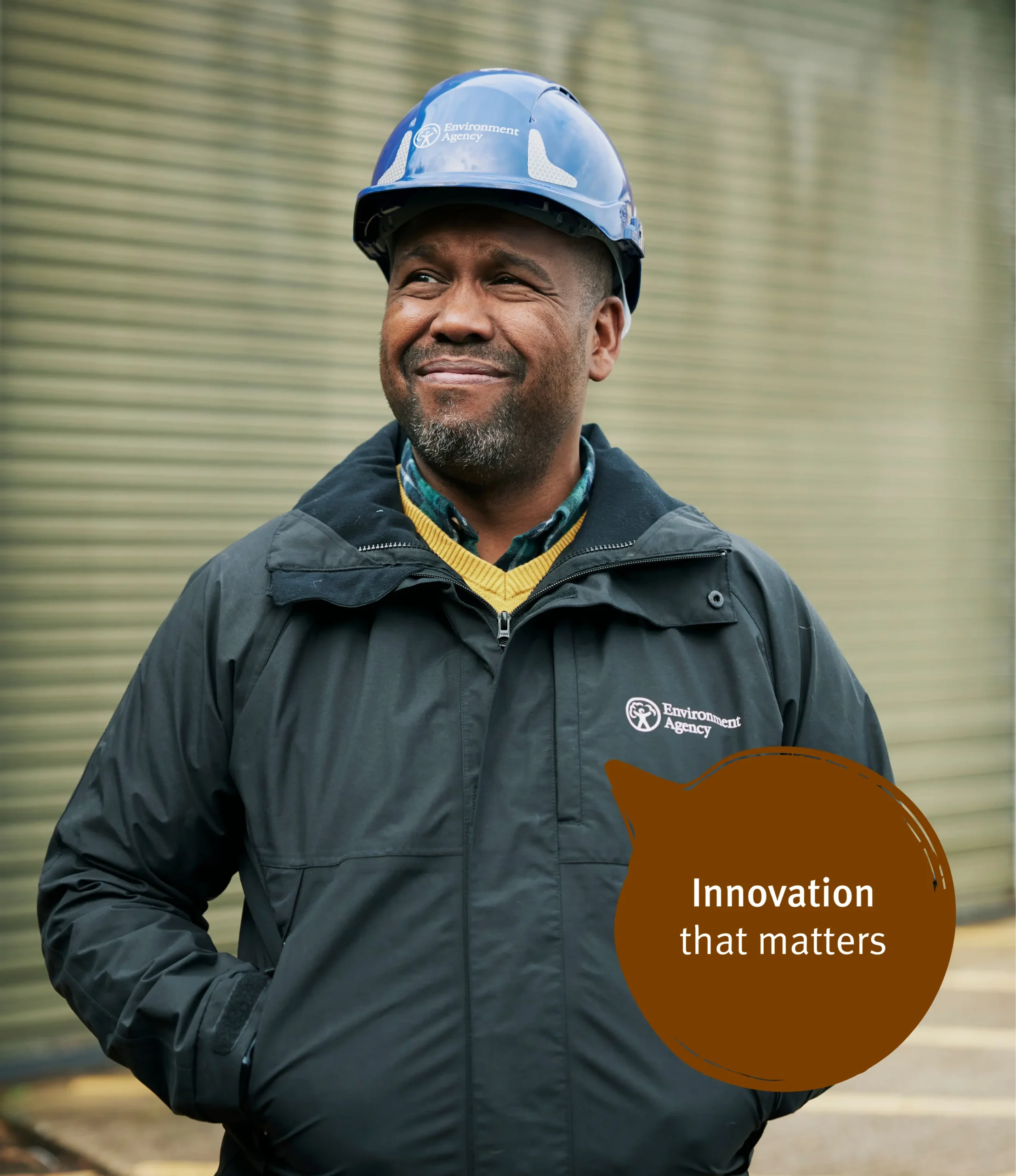 EA Staff member in hat smiling