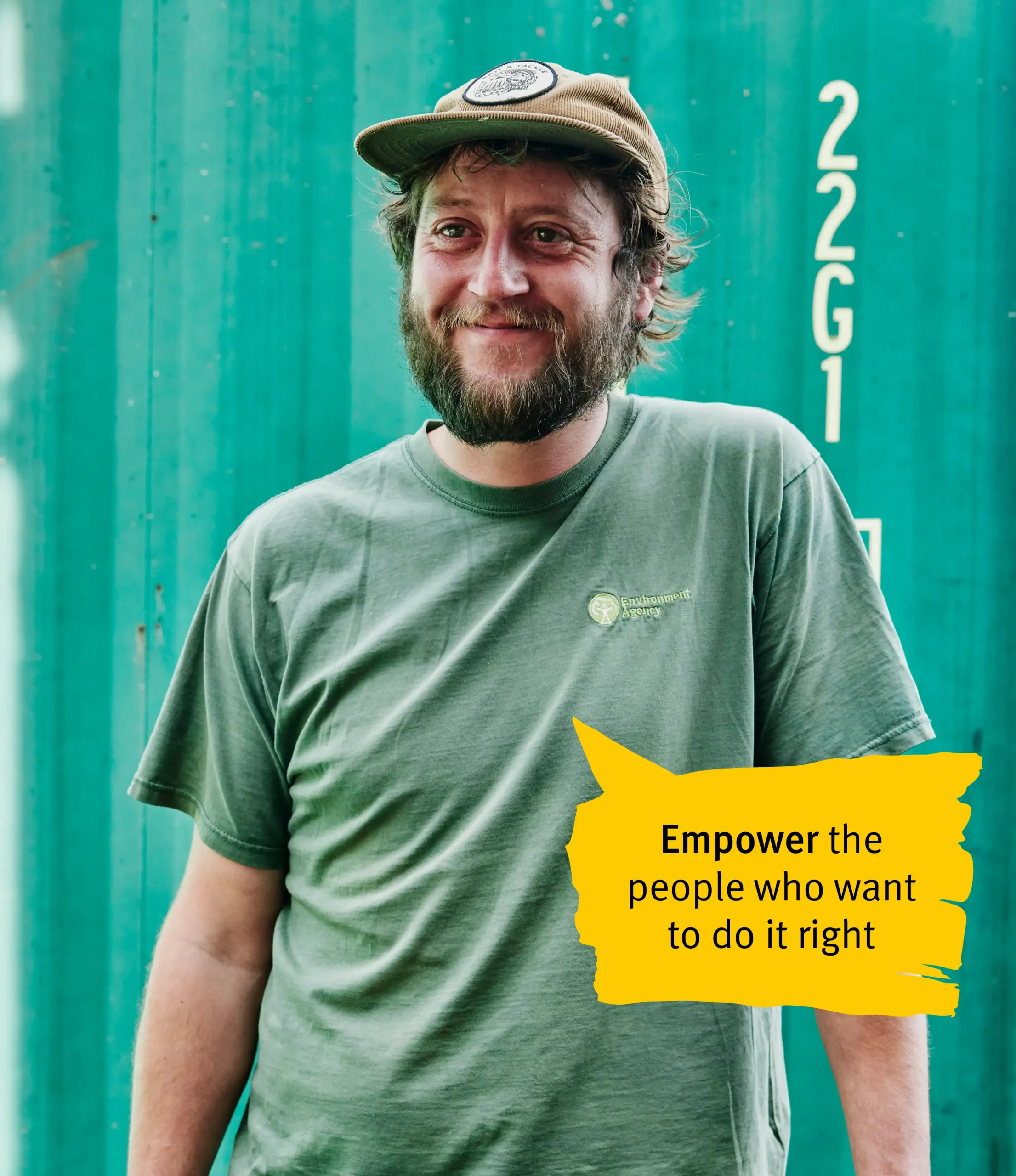 EA Staff member standing and laughing