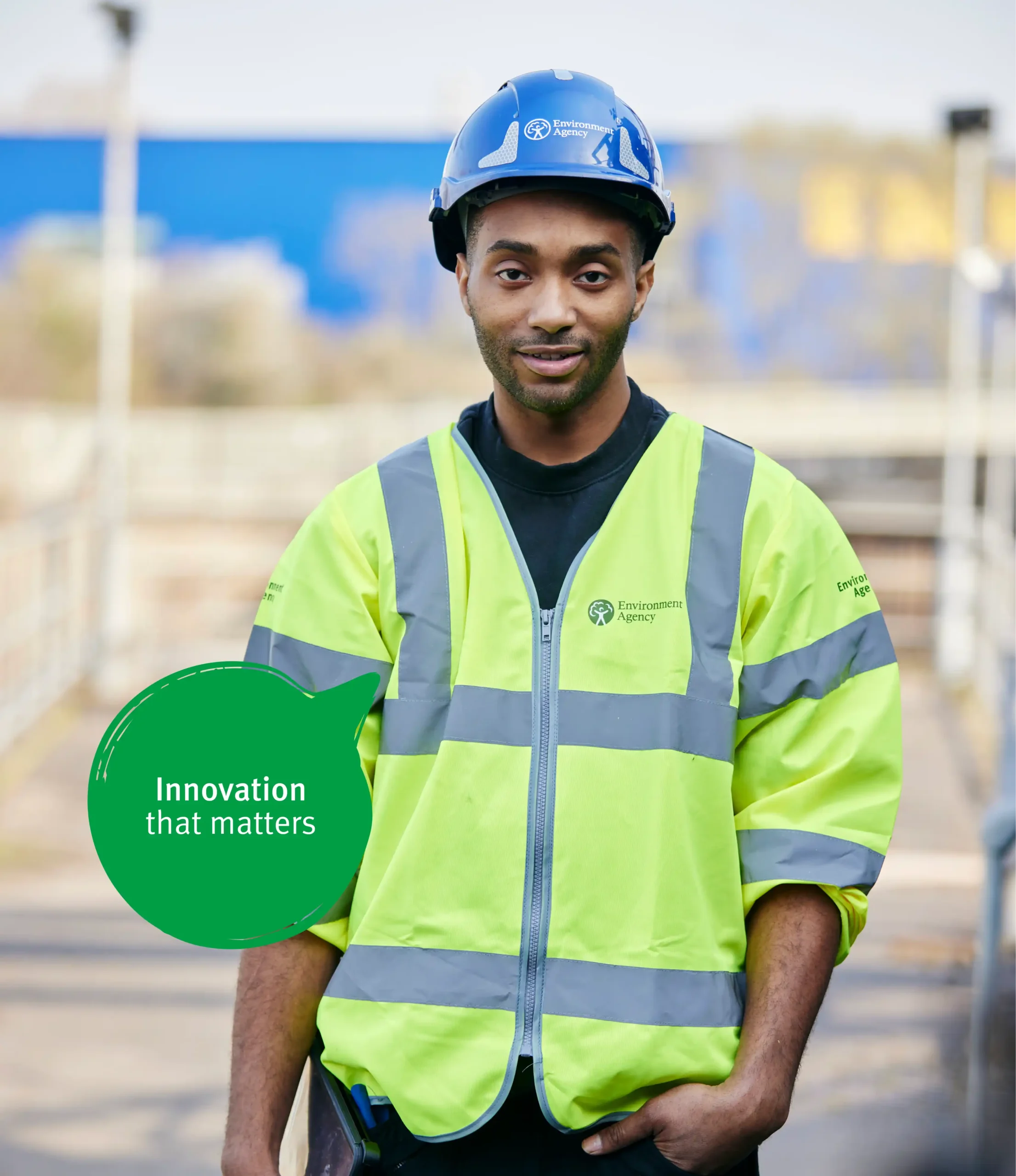 Man in yelllow vest standing