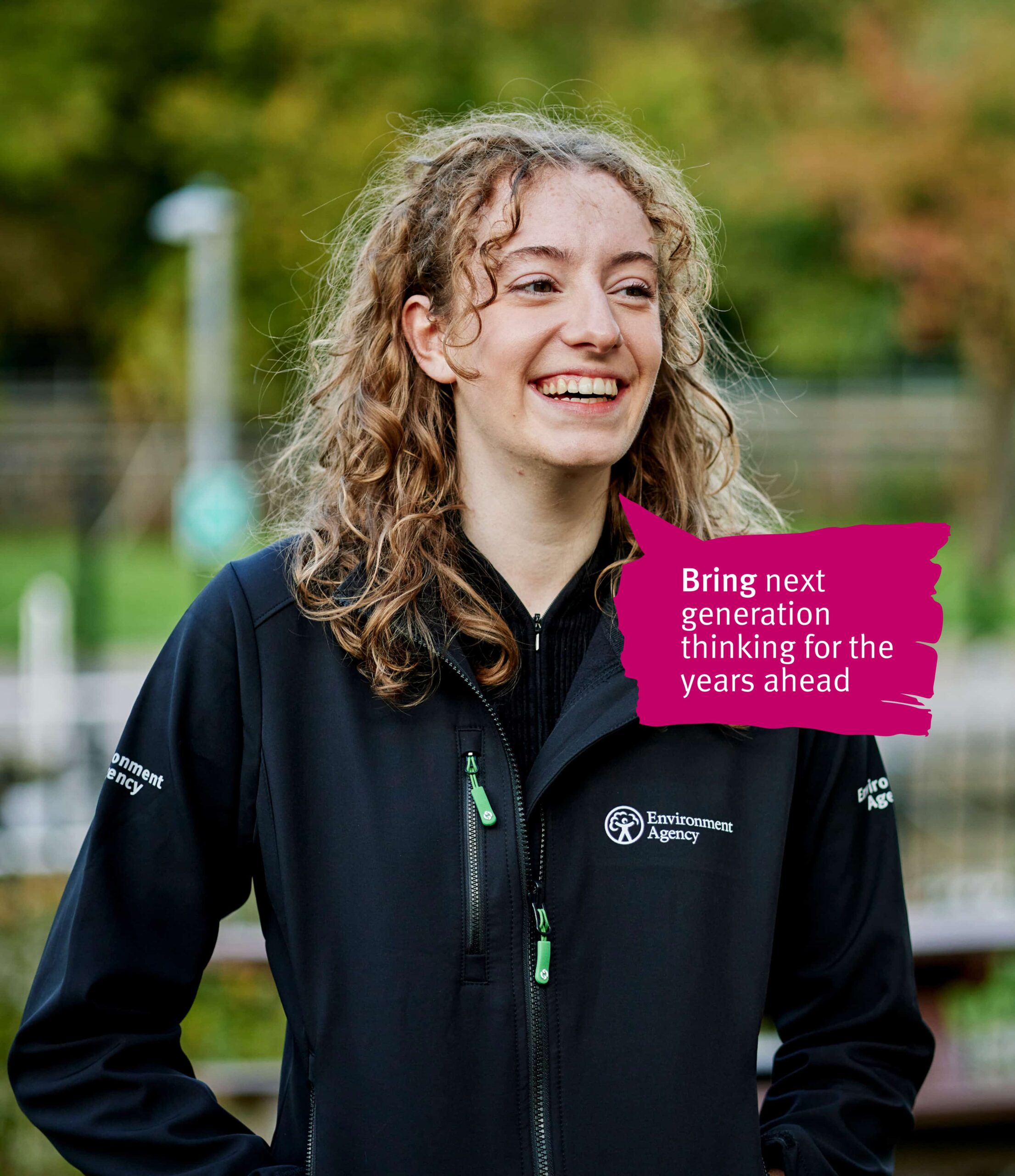 Girl smiling and looking towards left